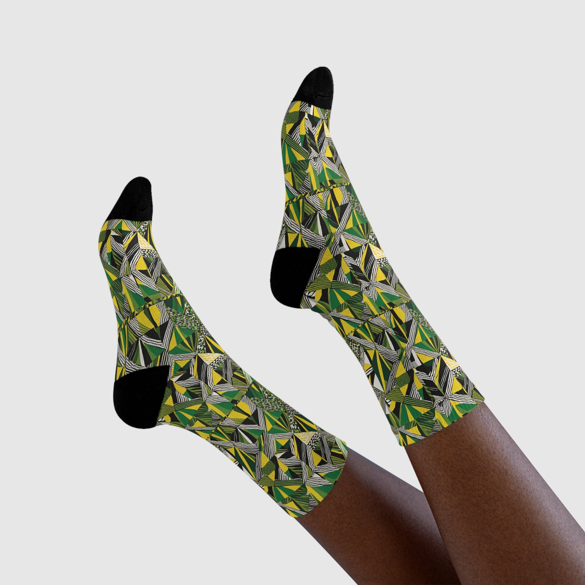 Grüne Socken mit Afro-Muster